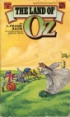 The Land of Oz; : being an account of the further adventures of the Scarecrow and Tin Woodman ... A sequel to The Wizard of Oz.